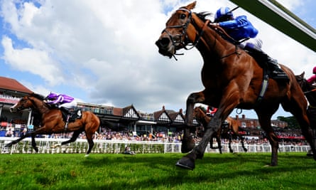 Point Lonsdale and Ryan Moore (left, purple silks) on their way to winning the Huxley Stakes.