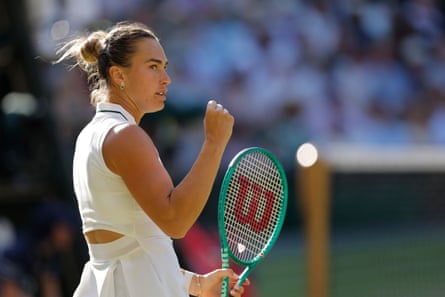 Aryna Sabalenka clenches her fist after winning a point.