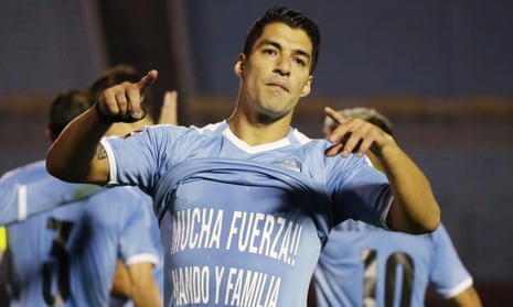 Luis Suárez celebrates after scoring for Uruguay in their World Cup qualifier against Chile in Montevideo on Thursday night