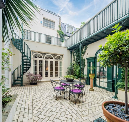 The patio at 93 Eaton Square, which includes an interconnecting two-bedroom mews house.