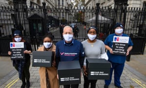 Graham Revie, chair of the RCN trade union committee (centre), with nurses (left to right) Natalie Brooks, Annette Bailey, Temitope Soile and Gerard Swinton at Downing Street today handing in the Fair Pay for Nursing petition.