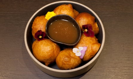 'Served with sweet caramel sauce': puff puff.