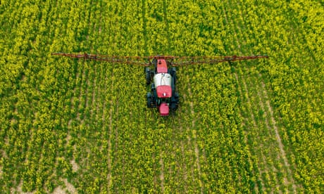 A farmer spreads pesticide on a field in Centreville, Maryland, on 25 April 2022.