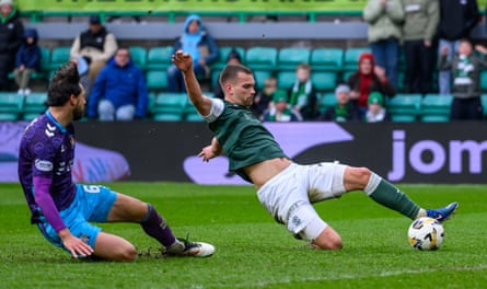 Ante Suto stretches to score Hibernian’s third against Kilmarnock at Easter Road.