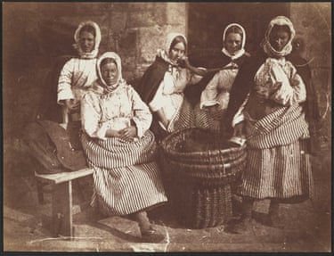 Fishwives returned from Market. Group including Mrs Grace Ramsay, calotype print taken 1843-6The fishwives of Newhaven were celebrated for their beauty, and known for their confidence and their distinctive costume. They brought great loads of fish in creels on their back up to the heights of the City to sell them directly. At a time of economic depression, high mortality, endemic illness and the desperate potato famine, the direct provision of good fresh fish to the people enabled the City to survive