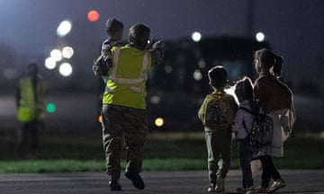 Children evacuated from Afghanistan arrive in the UK in August 2021.