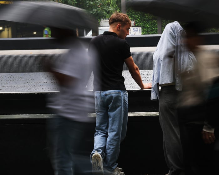 ‘I feel the pain of all those souls’: Ground Zero visitors remember lives lost on 9/11