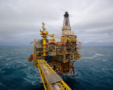 A gas platform surrounded by sea.