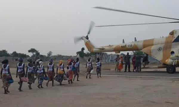 Some of the women being led to safety aboard a Nigerian army helicopter in 2017.