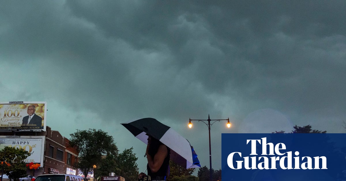Photo: The Guardian Severe Storms Kill 3 and Leave Over 800,000 Without Power in the Midwest