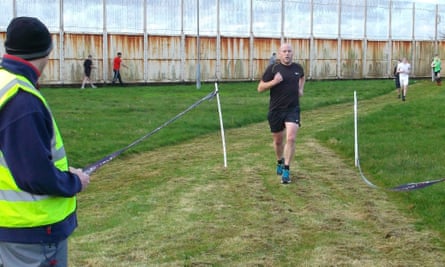 A member of Haverigg prison’s staff finishes the Black Combe parkrun.