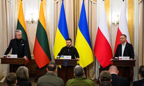 Lithuania’s President Gitanas Nauseda, Ukraine’s President Volodymyr Zelenskiy and President Andrzej Duda of Poland attend a press conference in the western Ukrainian city of Lviv.