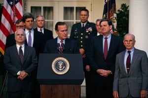 US Senator John McCain, Senator John Kerry, President George Bush, Chairman of the Joint Chiefs Colin Powell, and General John Vessey attend a press conference about soldiers missing in action during the Vietnam War.