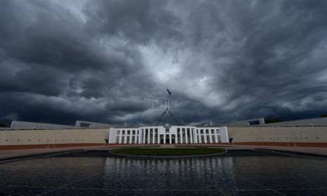 Storm clouds are seen building up over Parliament House in Canberra, Feb. 19, 2014