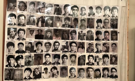 Photograph taken in March 2019, and released on May 29 2019 by the Tiananmen Mothers via Human Rights in China, shows portraits of people who were killed in the 4 June 1989 crackdown on pro-democracy protests in Beijing. 