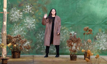 Designer Emily Bode greets the audience at the end of her Fall/Winter 2020-2021 show at Paris Fashion Week.