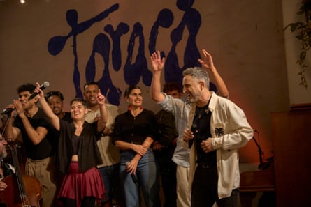 Uruguayan singer-songwriter Drexler performs alongside musicians