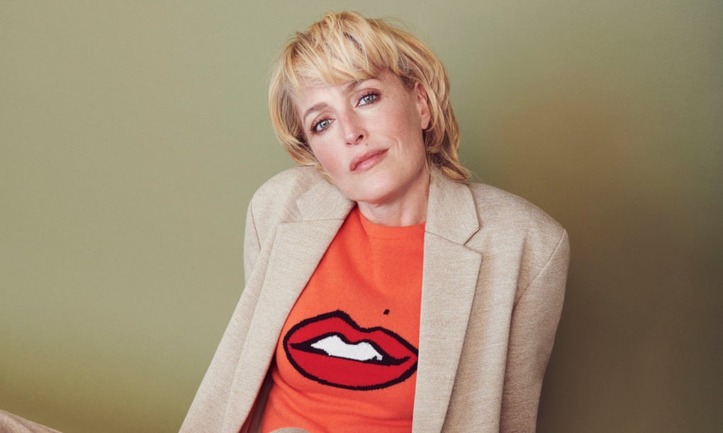 ‘It’s been a while since I’ve been in something that is so universally watched as this is’: Gillian Anderson on Netflix’s Sex Education. Here she wears her own Gillian Anderson for Winser London crew neck with lips and distinctive beauty spot. 