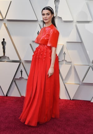 Rachel Weisz bucked the trend for either a hot pink dress or train by wearing a red latex and tulle two-part Givenchy Haute Couture gown, with a gently cinched embroidered waist. It was a modern take on the historical, much like the film. The Greco-silver headband is straight off the spring/summer catwalk, though there were surprisingly few of these on the red carpet...