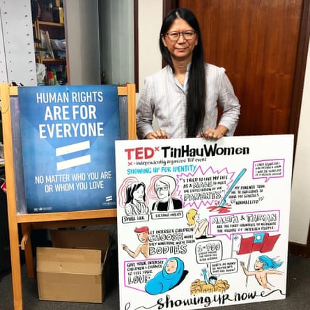 Small Luk with a sign saying Human Rights are for everyone