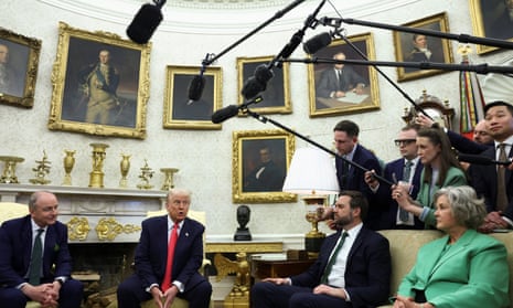 US president Donald Trump reacts during a meeting with Irish taoiseach Micheál Martin, with US vice-president JD Vance sitting near them, in the Oval Office at the White House in Washington DC.