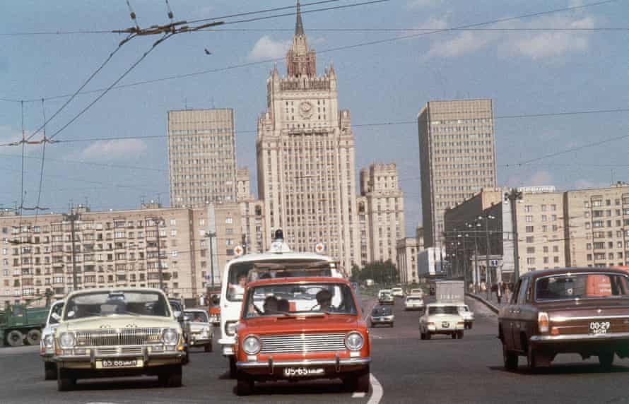 Framed by modern building of the Hotel Belgrade in downtown Moscow, the Soviet Foreign Ministry in its Stalinist style,