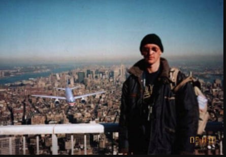 Faked image of a tourist standing on top of one of the twin towers before a plane hit, with the plane seen behind him