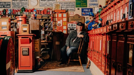 Arthur Reeder sits successful a room filled pinch postboxes and nationalist signs