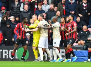 Bournemouth’s Jefferson Lerma is held back by Aaron Ramsdale.