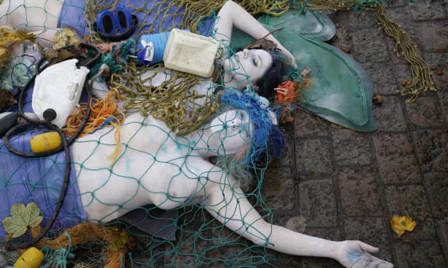 Members of Ocean Rebellion dressed as mermaids and mermen to highlight the impact of industrial fishing