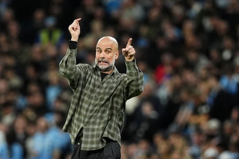 Manchester City manager Pep Guardiola gestures on the touchline.