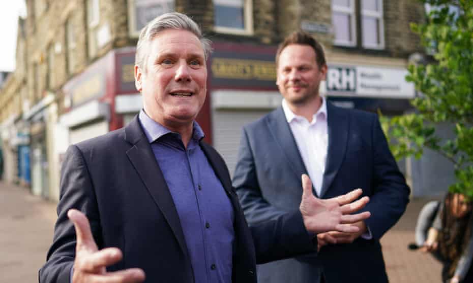 Keir Starmer and Simon Lightwood talk to the media in Wakefield