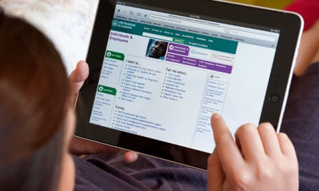 Woman uses online website to do tax return in the UK on an iPad