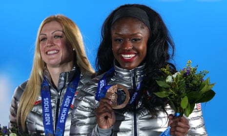 Aja Evans, right, won an Olympic bronze medal in the two-woman bobsleigh at the 2014 Sochi Winter Games with Jamie Greubel, left.