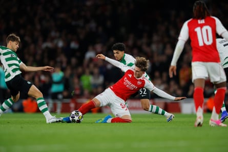 Arsenal’s Max Dowman puts in a challenge against Sporting.