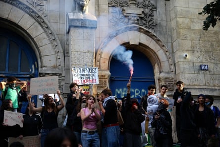 Students gather outside the Lycée Voltaire in Paris.