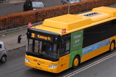 A single-decker bus on a city street