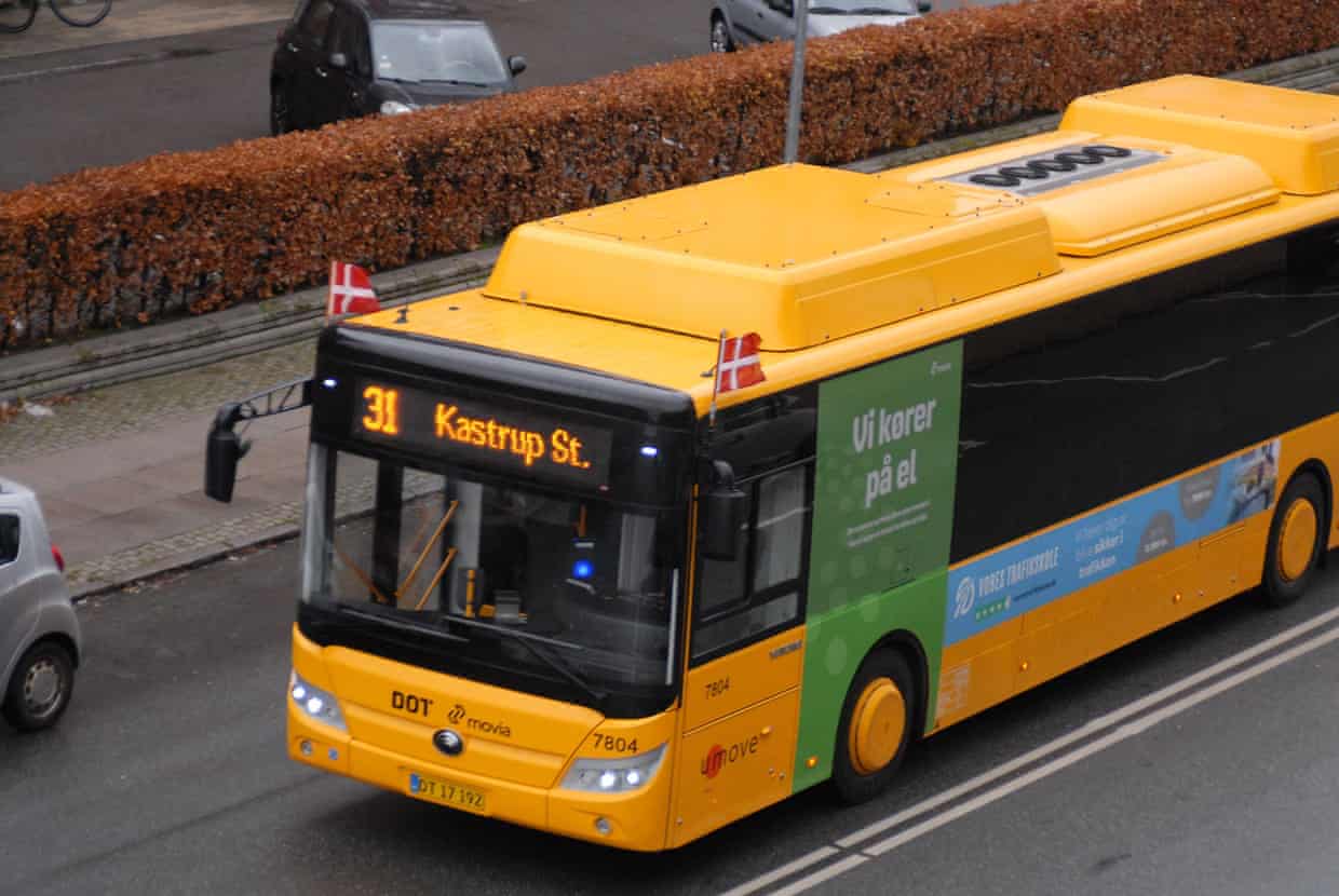 A single-decker bus on a city street