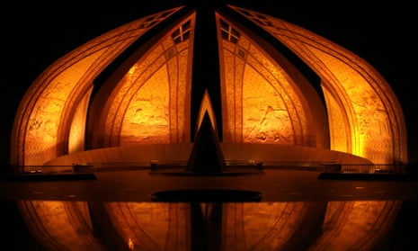 The national monument of Pakistan in Islamabad bathed in orange light