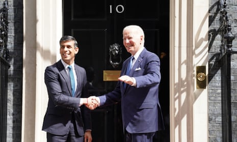 Joe Biden and Rishi Sunak shake hands at the door of Number 10.