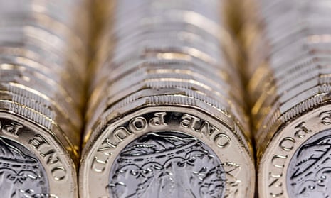 One pound coins in columns