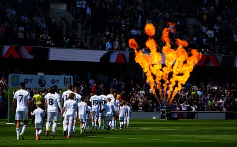 The Fulham players take to the pitch.