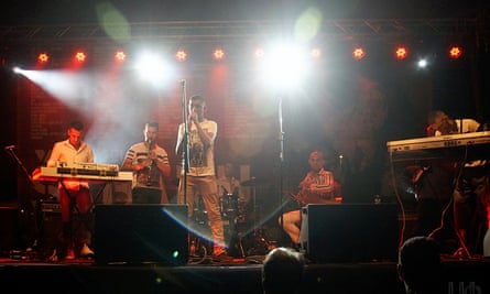 Band performing on a neon-lit smoky-looking stage at Nišville Jazz Festival, Niš, Serbia.