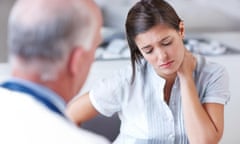 Its a tough diagnosis to process<br>Distraught woman looking down while receiving some upsetting news from her doctor - copyspace