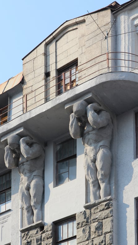 Expressionist … granite torsos holding up the Kupetskyi bank and hotel.