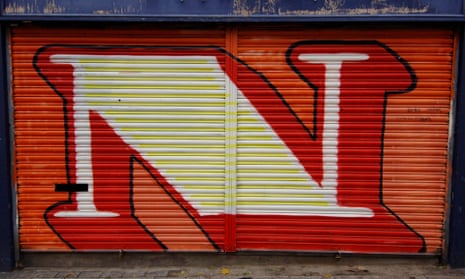 A large letter N painted on a shop shutter in Broadway Market, Hackney, east London in 2005