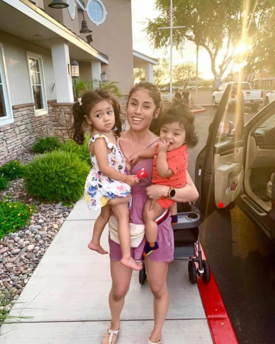 Mariah Valenzuela with her two children, ages two and three.