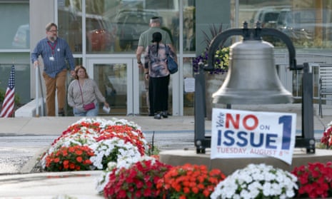Voters come and go at the Beachwood Community Center in Beachwood, Ohio during the special election on Issue 1.