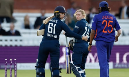 England’s Charlie Dean is consoled by Freya Davies after her decisive wicket handed victory to India on Saturday.