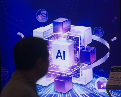 A man walks in front of an AI sign at the Shanghai New Expo Center during the WAIC conference